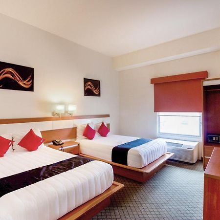 Capital O Hotel Herederos, Пьедрас-Неграс Экстерьер фото