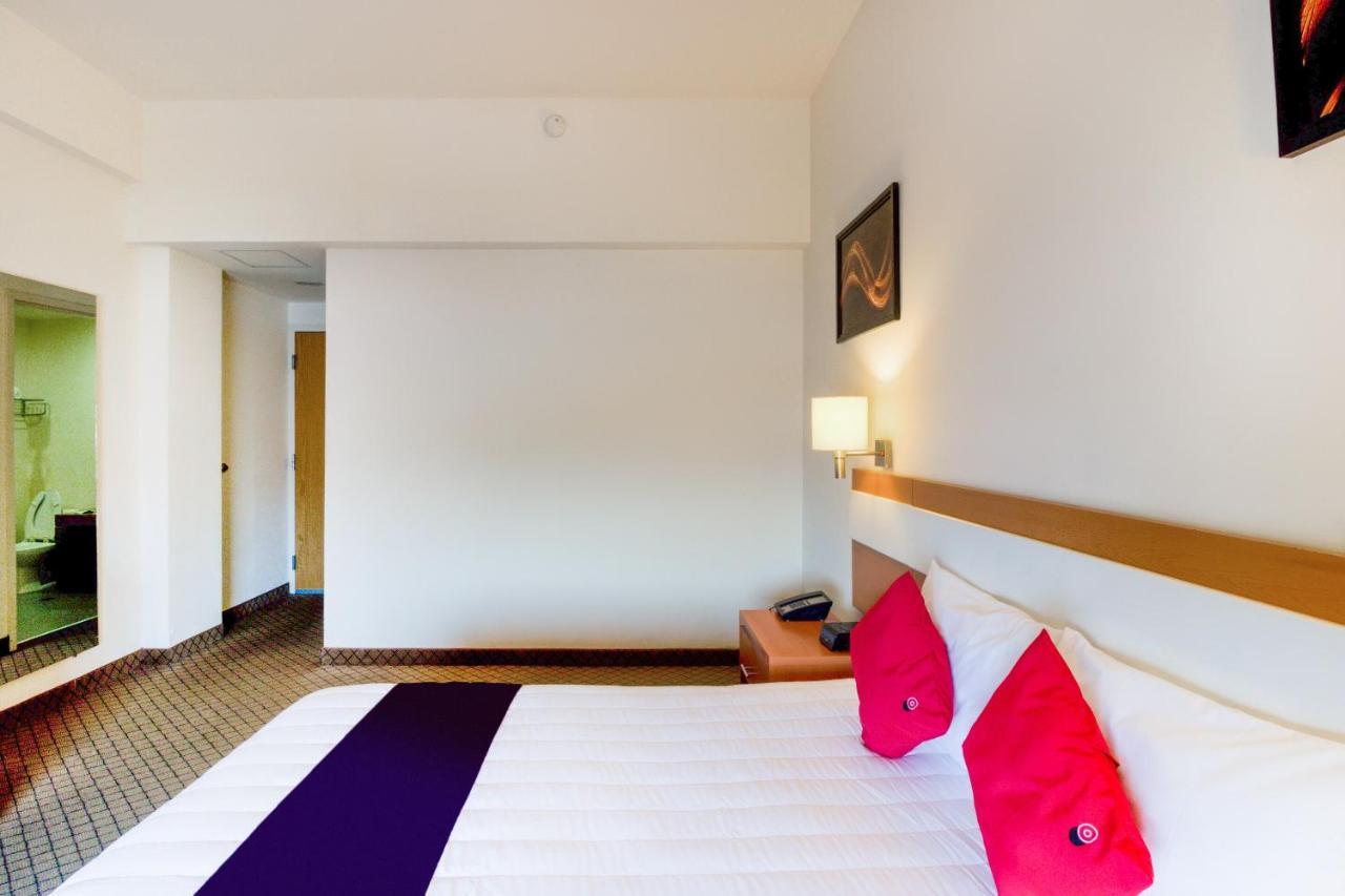 Capital O Hotel Herederos, Пьедрас-Неграс Экстерьер фото