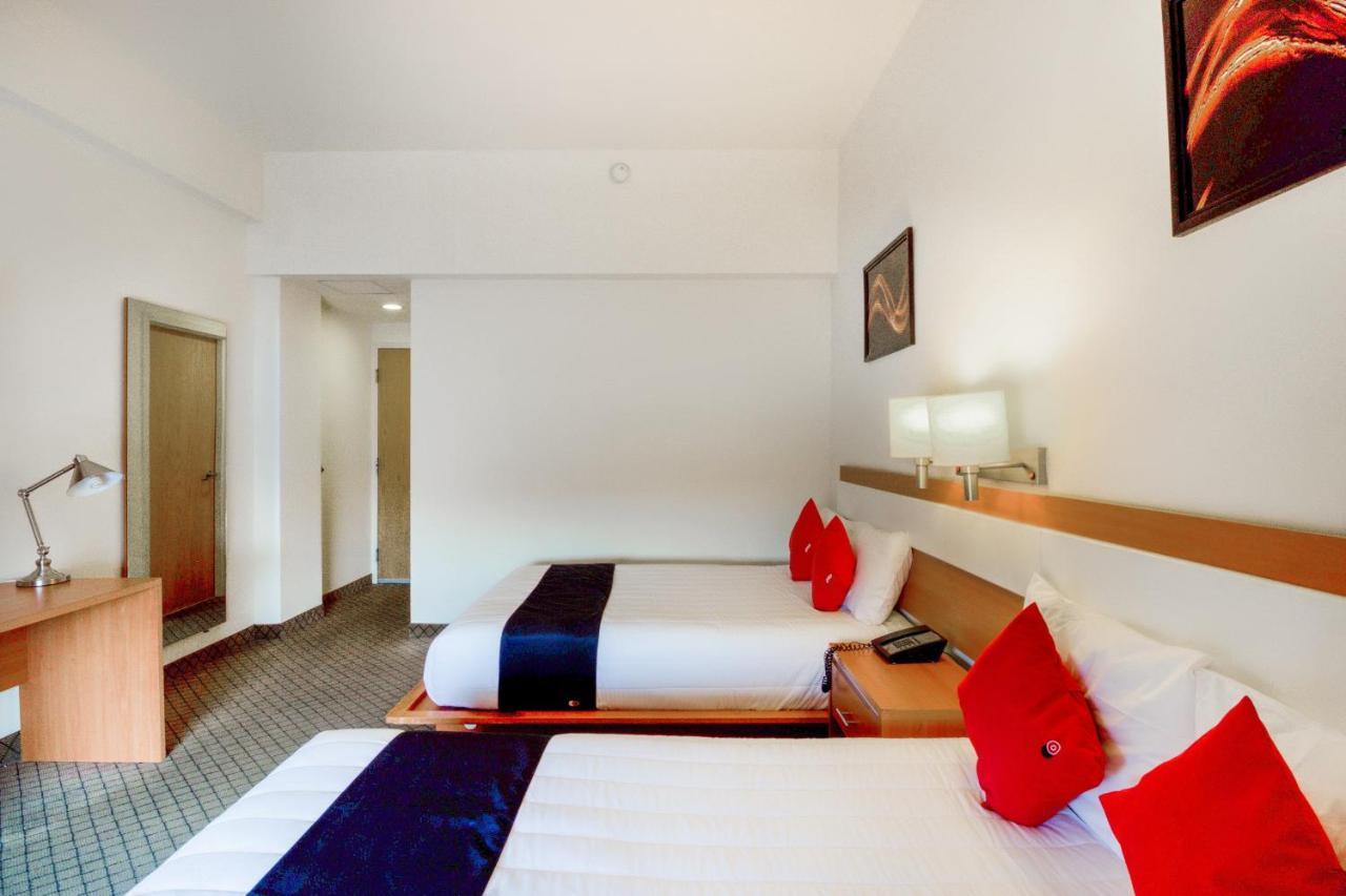 Capital O Hotel Herederos, Пьедрас-Неграс Экстерьер фото