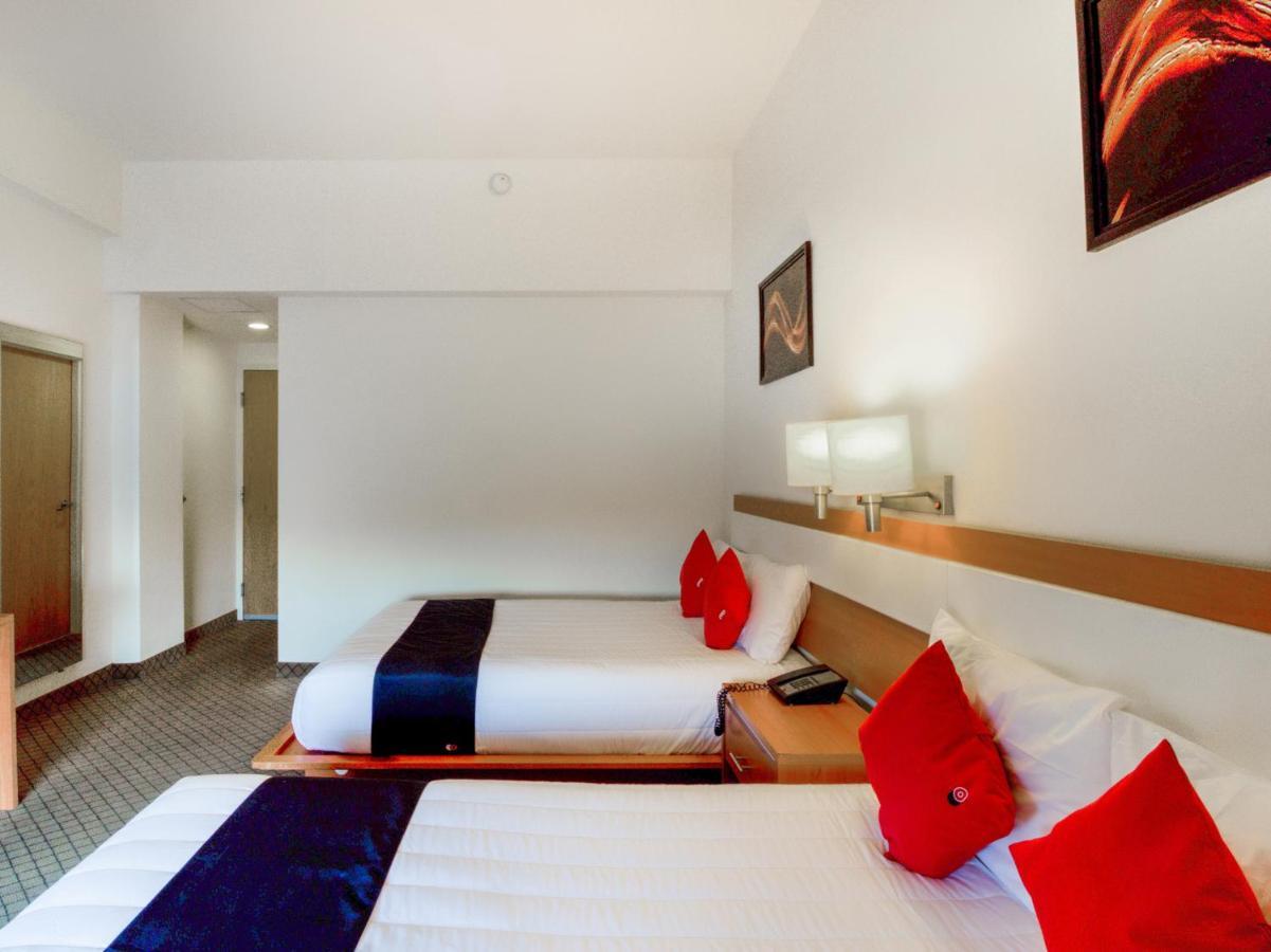 Capital O Hotel Herederos, Пьедрас-Неграс Экстерьер фото