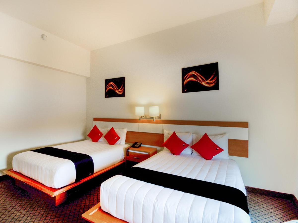 Capital O Hotel Herederos, Пьедрас-Неграс Экстерьер фото